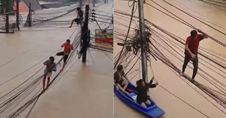 Caminaron sobre cables eléctricos para salvarse de las inundaciones que azotan Tailandia: el video